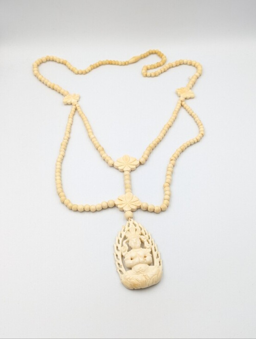 Vintage wood bead and carved bone Guan Yin pendant necklace